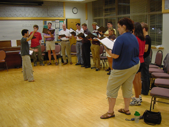 Choir rehearsing in the dance room